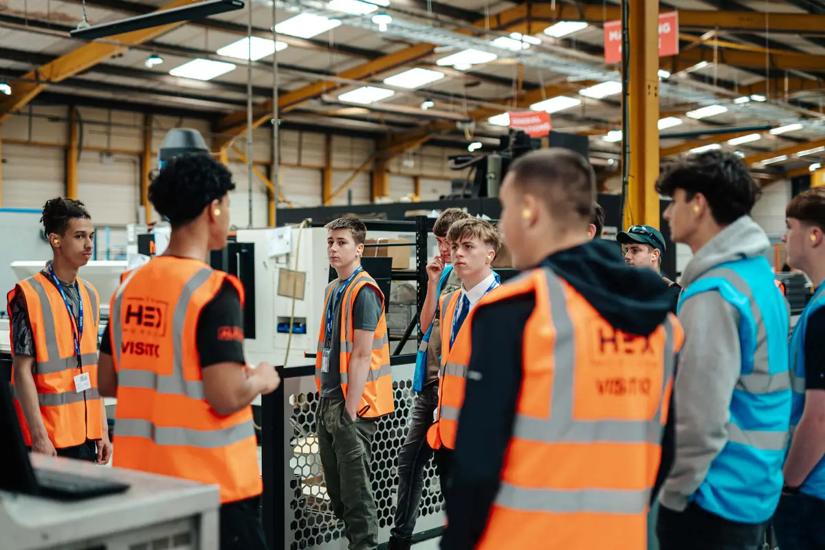 Students touring The HEX Group manufacturing facility